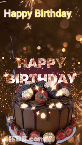 A Chocolate Birthday Cake With Strawberries And Fireworks With The Words Happy Birthday GIF