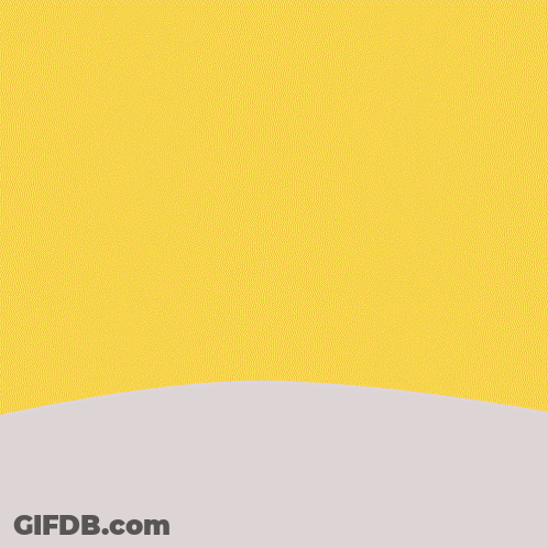 A Chocolate Cake With Whipped Cream And A Cherry On Top GIF