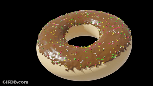 A Chocolate Covered Donut With Sprinkles On It GIF