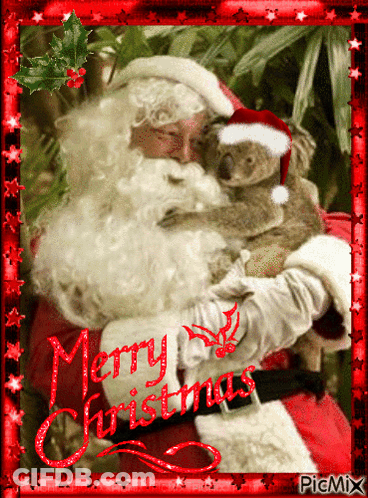 A Christmas Card With Santa Holding A Koala Bear GIF
