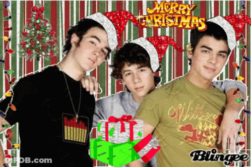 A Christmas Card With Three Boys Wearing Santa Hats GIF