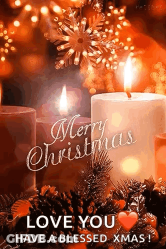 A Christmas Card With Two Lit Candles And The Words `` Merry Christmas Love You Have A Blessed Christmas '' . GIF