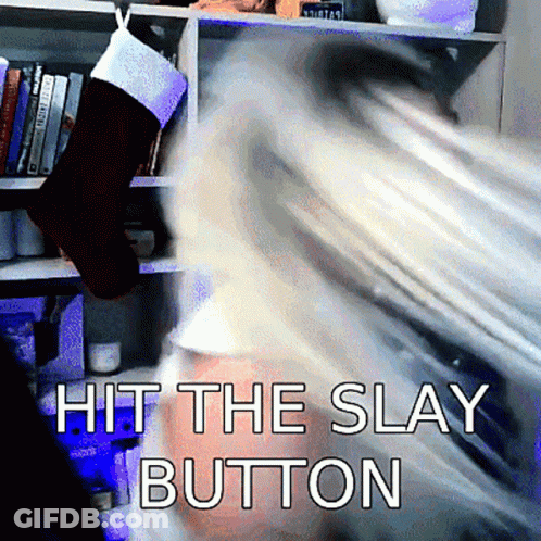 A Christmas Stocking Hangs On A Shelf With The Words Hit The Slay Button Below It GIF