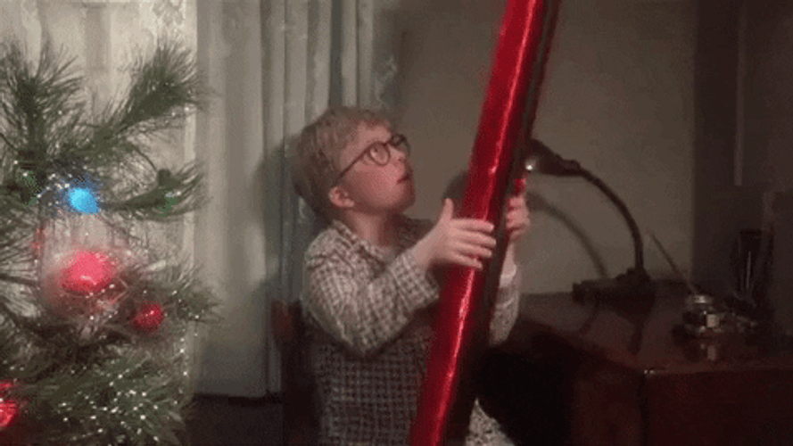 A Christmas Story Ralphie Opening Gift GIF