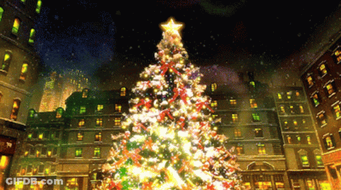 A Christmas Tree With A Star On Top Is Lit Up In A City At Night GIF