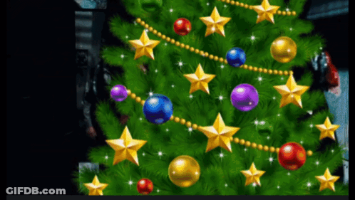 A Christmas Tree With Balls Stars And Beads On It GIF