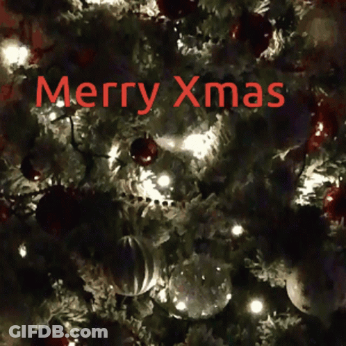 A Christmas Tree With The Words Merry Xmas Written In Red GIF