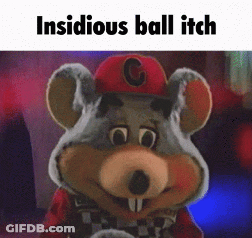 A Chuck E Cheese Mascot With The Words Insidious Ball Itch GIF