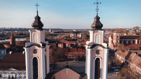 A Church With A Cross On The Top Of It GIF