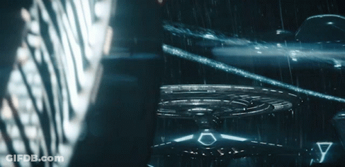 A Circular Object With A Triangle On The Bottom Of It GIF
