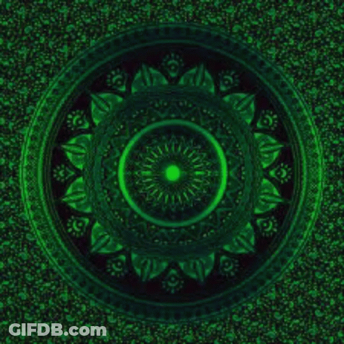 A Circular Pattern With A Red Center On A Dark Background GIF