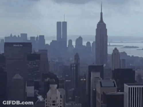 A City Skyline With The Empire State Building In The Background GIF