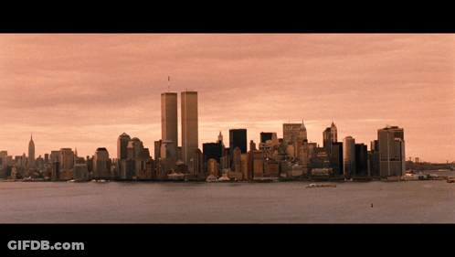 A City Skyline With The Twin Towers In The Middle GIF
