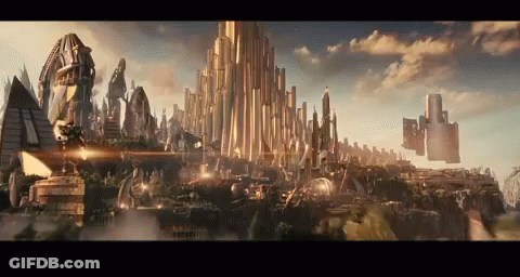 Cityscape With Tall Buildings And Cloudy Sky GIF