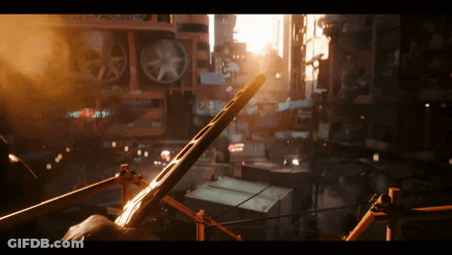 A Cityscape With A Sign That Says ' A Few Steps To Paradise ' On It GIF