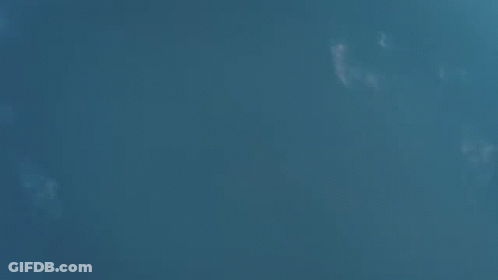 A Cityscape With The Words 100 Years Later Written On It GIF
