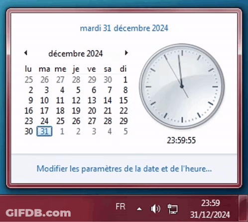A Clock Displays The Time Of 23:59 On December 31St GIF