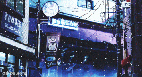 A Clock Hanging From A Pole Shows The Time As Almost Midnight GIF