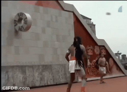 A Clock Hanging On A Wall Shows The Time As 9:45 GIF