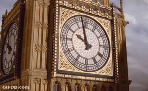 A Clock On A Building That Says ' Big Ben ' At The Top GIF
