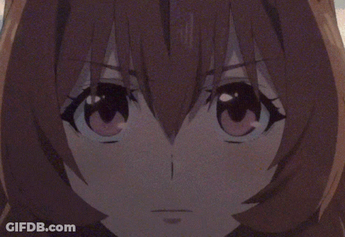 A Close Up Of A Anime Character 'S Face With A Blurred Background GIF