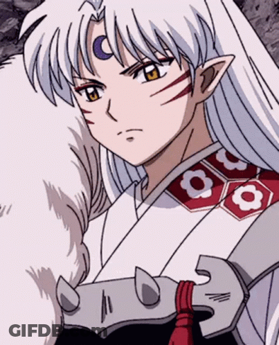 A Close Up Of A Anime Character With Long White Hair And A Sword . GIF