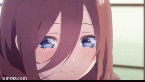 A Close Up Of A Anime Girl With Blue Eyes And Brown Hair . GIF
