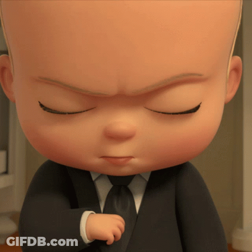A Close Up Of A Baby In A Suit With His Eyes Closed GIF