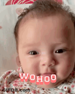 A Close Up Of A Baby 'S Face With The Words ' Wohoo ' Written On It . GIF