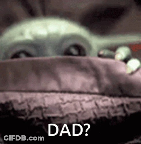 A Close Up Of A Baby Yoda With The Words `` Dad '' Written Next To It . GIF