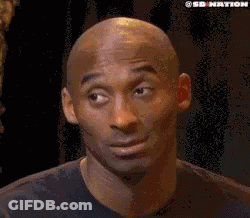 A Close Up Of A Bald Man Making A Funny Face . GIF