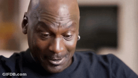A Close Up Of A Bald Man 'S Face With A Slight Smile On His Face . GIF