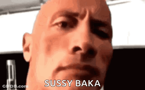 A Close Up Of A Bald Man 'S Face With The Words `` Sussy Baka '' Written Next To Him . GIF