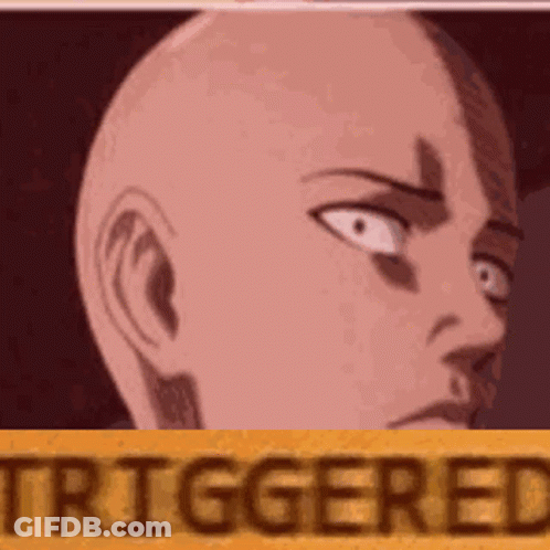 A Close Up Of A Bald Man 'S Face With The Words `` Triggered '' Written On It . GIF