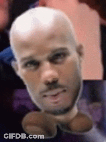 A Close Up Of A Bald Man 'S Head With A Beard GIF