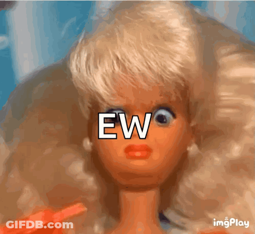 A Close Up Of A Barbie Doll 'S Face With The Word Ew Written On It GIF