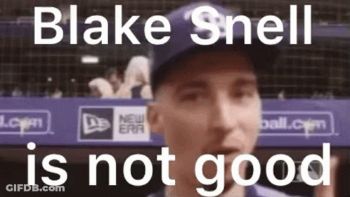 A Close Up Of A Baseball Player Wearing A Blue Hat With The Words Blake Snell Is Not Good Behind Him . GIF
