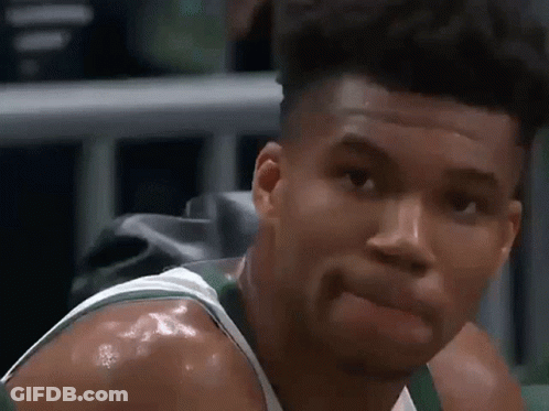 A Close Up Of A Basketball Player Making A Funny Face GIF