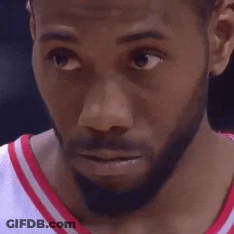 A Close Up Of A Basketball Player 'S Face With A Beard And A Smile . GIF