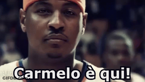 A Close Up Of A Basketball Player 'S Face With The Words Carmelo E Qui Written On It . GIF