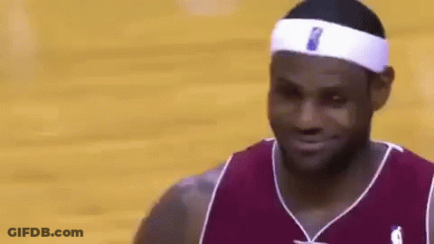 A Close Up Of A Basketball Player Wearing A Headband And Smiling On A Court . GIF