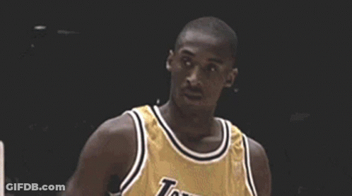 A Close Up Of A Basketball Player Wearing A Purple Jersey GIF