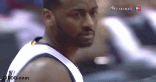 A Close Up Of A Basketball Player With A Playoffs Logo In The Corner GIF
