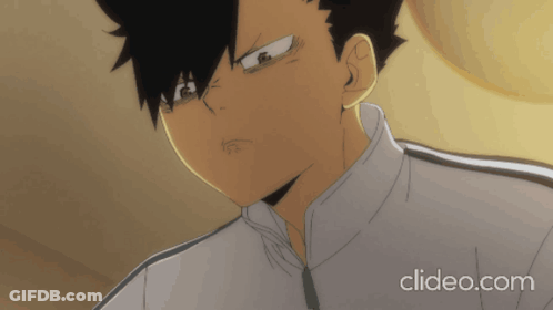 A Close Up Of A Black Haired Anime Character With The Website Clideo.com In The Corner GIF