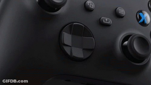 A Close Up Of A Black Xbox Controller With A Blue X On The Bottom Right GIF