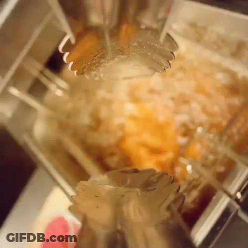 A Close Up Of A Blender Being Used To Make A Smoothie GIF