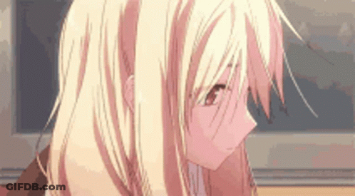 A Close Up Of A Blonde Anime Girl 'S Face With Her Eyes Closed . GIF