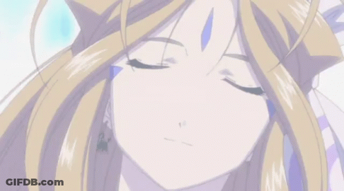 A Close Up Of A Blonde Anime Girl With Her Eyes Closed GIF