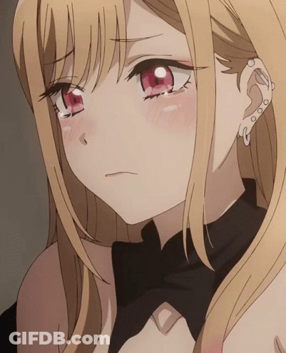 A Close Up Of A Blonde Anime Girl With Red Eyes And A Piercing In Her Ear GIF