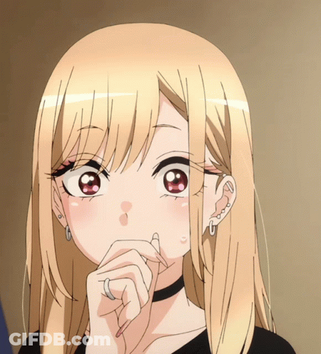 A Close Up Of A Blonde Anime Girl With Red Eyes GIF
